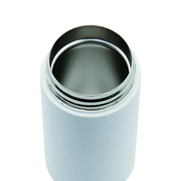 Top view of a Japanese Imabari towel and stainless steel bottle arranged together